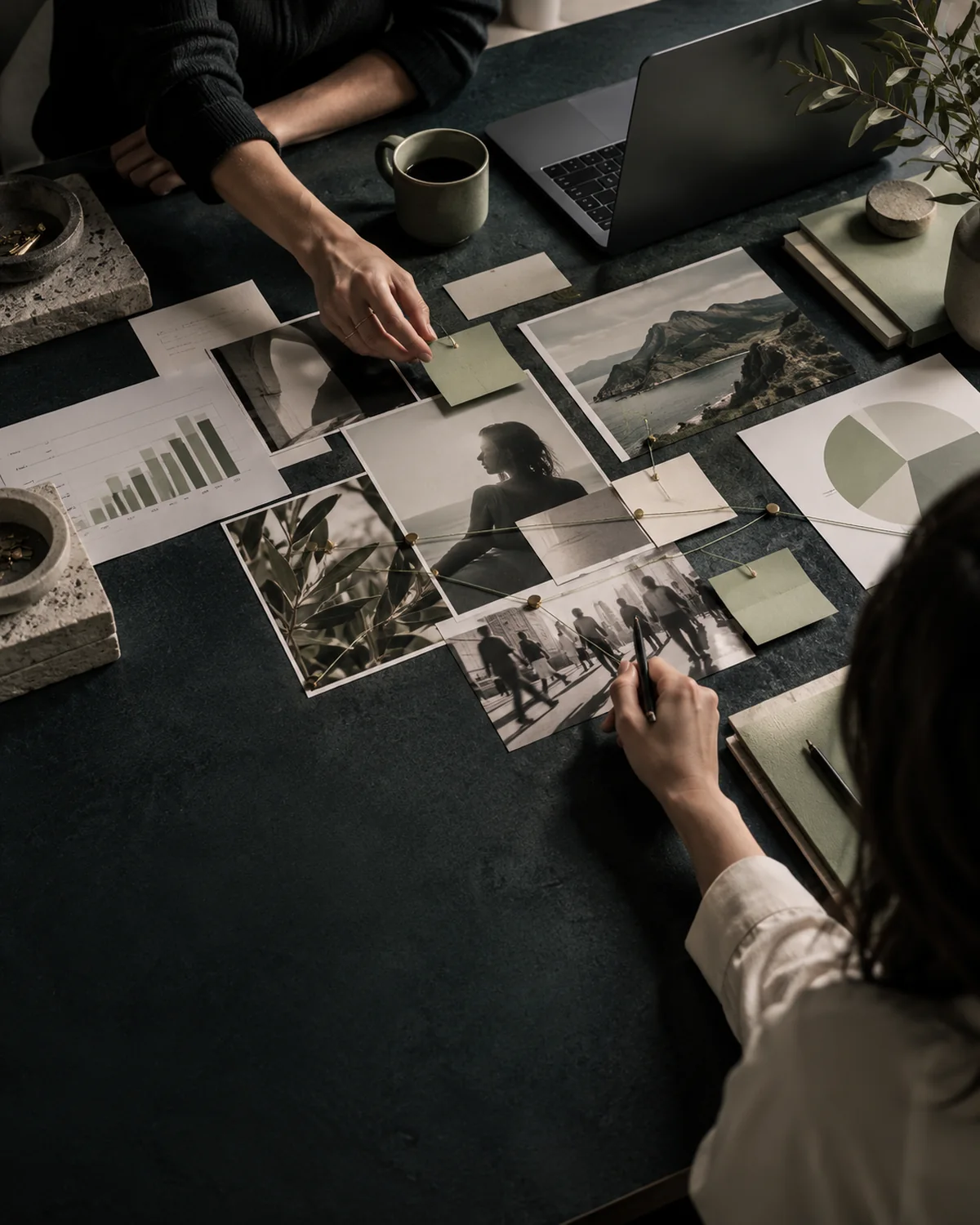 Creative strategy session with market research, audience imagery and planning materials