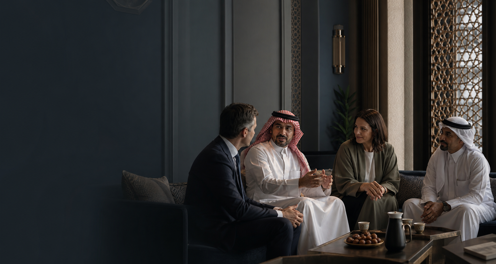 Saudi and international executives building relationships in a Riyadh majlis