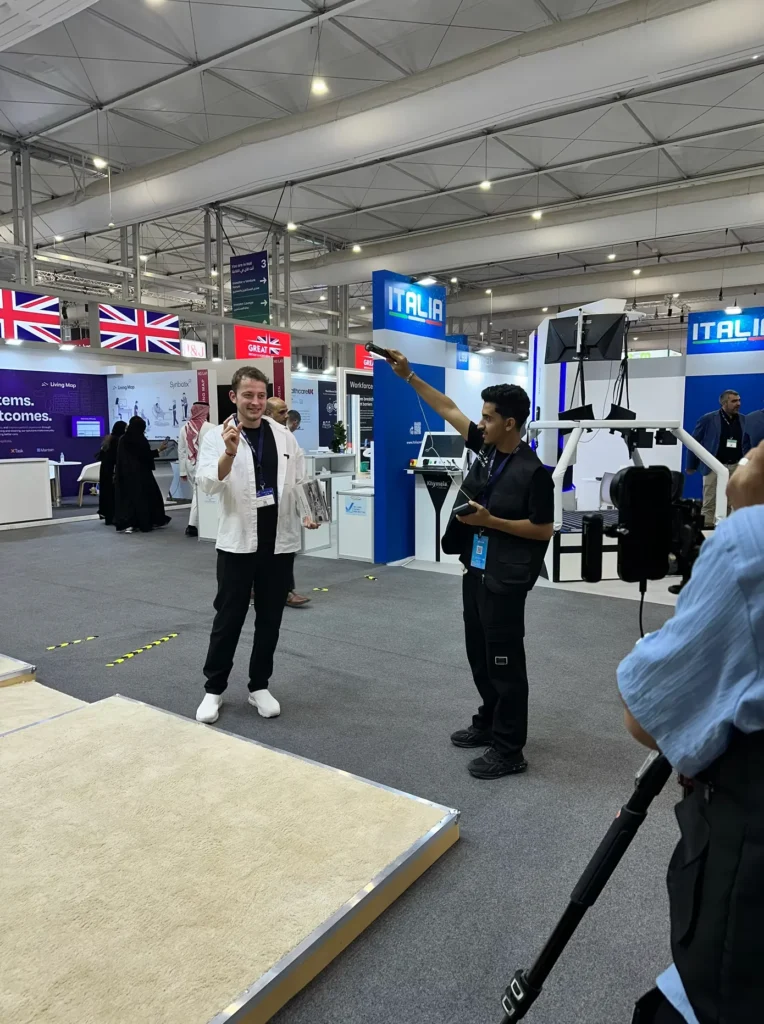 Interview being filmed in the international exhibitors area at the Global Health Exhibition.