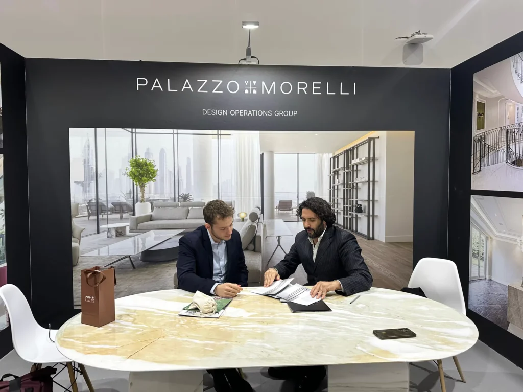 Business meeting at the Palazzo Morelli design and interiors stand.